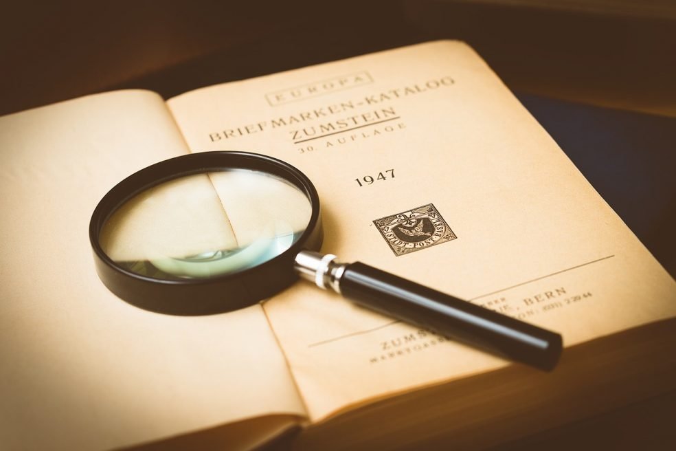 a magnifying glass describing patent search